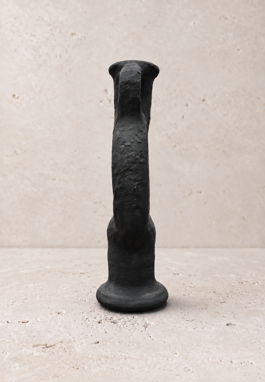Obsidian vase, side view of the matte black sculptural ceramic