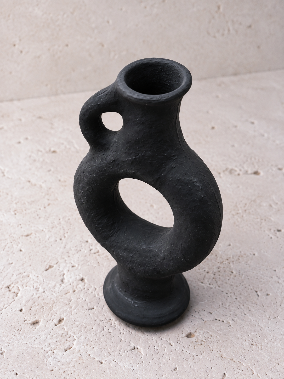 Detail of the rough volcanic texture on the Obsidian matte black vase