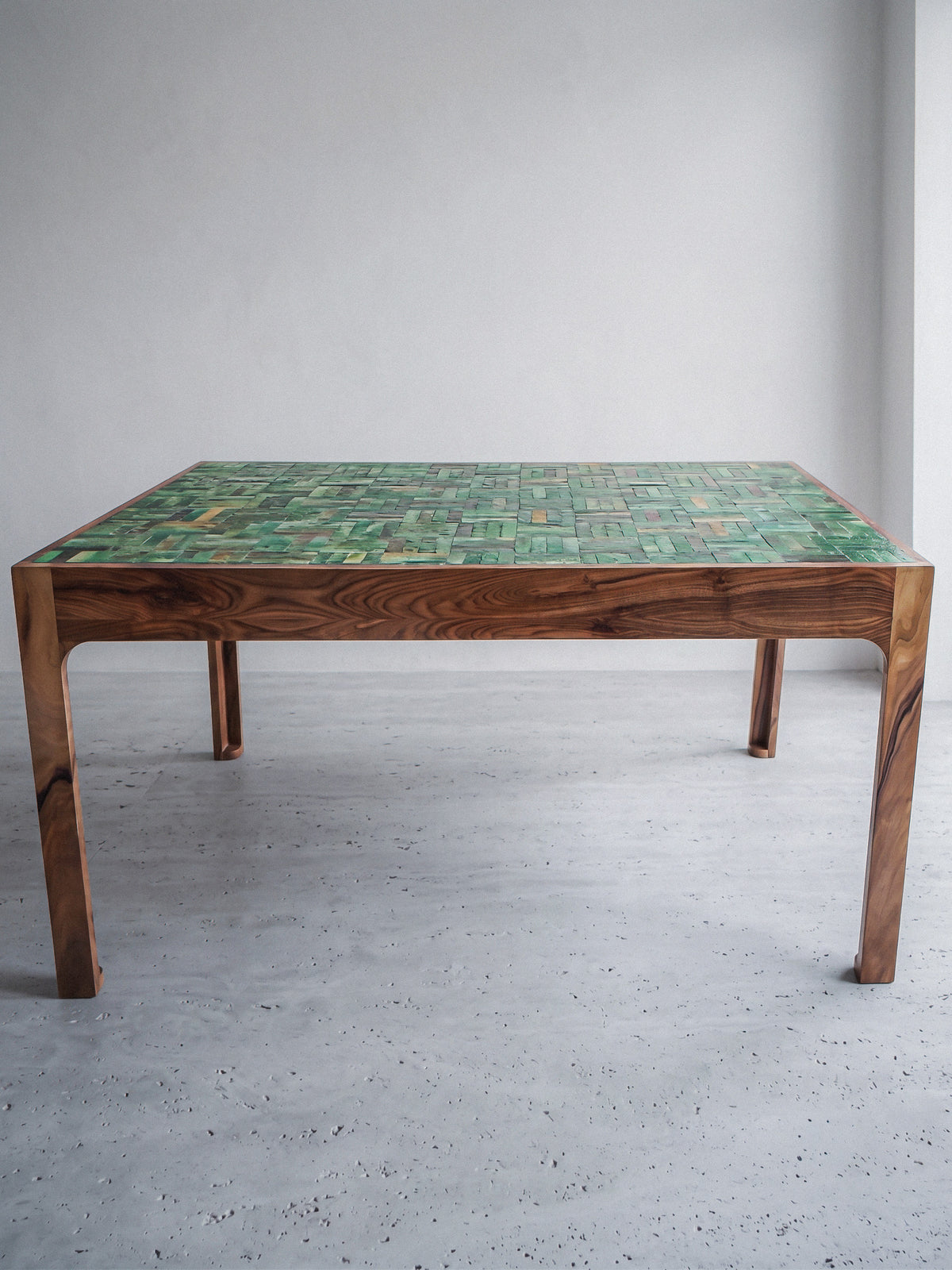 Sculptural walnut and Tamegrout table, three-quarter view